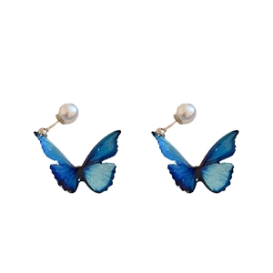 Blue gradient butterfly earrings with white pearls, elegant jewelry on white background