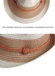 Detail of soft foldable straw sun hat showing beige and brown woven texture and knot