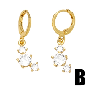 Elegant gold earrings with white zircon sun pendants and sleek circular hoop design