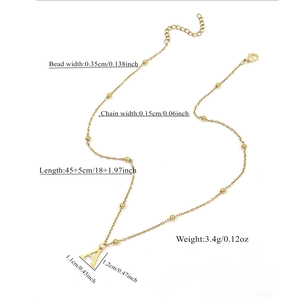 Detailed view of golden initial A necklace with bead chain and dimensions