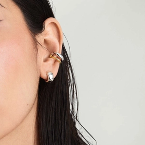 Minimalist 18k gold and stainless steel two-tone double layer ear cuffs on a model
