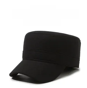 Detail of black wool military cap with metallic F-logo and hidden ear flaps for men