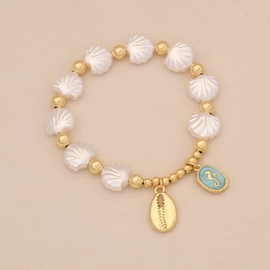 Ocean theme beaded shell bracelet with 18K gold seahorse and cowrie shell charms