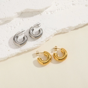 Minimalist chunky C-shape hoop earrings in polished gold and silver metal finishes