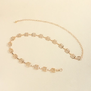 Minimalist gold metal waist chain featuring square links and a polished adjustable clasp