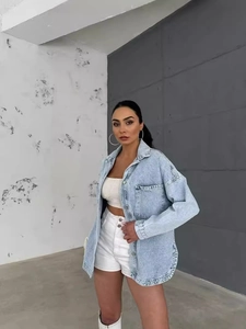 Retro oversized washed blue denim jacket for women featuring a loose boyfriend fit design