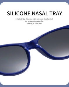 Detail of integrated silicone nasal tray on blue kids sunglasses for non-slip comfort