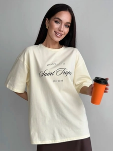 Detailed close-up of Saint Tropez printed cotton t-shirt with loose drop shoulder fit