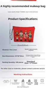 Detailed view of red linen nutcracker makeup bag with size dimensions and textile texture