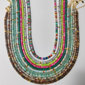 Colorful natural stone beaded necklace set with gold accents and heart charms