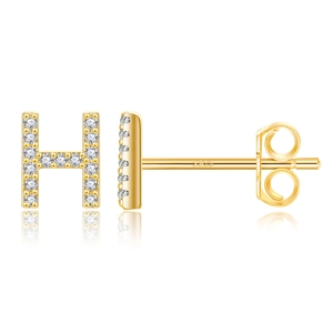 Macro detail of gold-plated S925 sterling silver H-letter earrings with pavé zircon stones