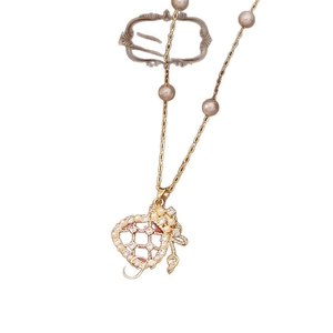 Gold plated pearl necklace with hollow heart pendant and sparkling zircon accents