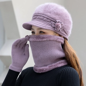 Detailed view of women's purple knitted winter set including hat, neck warmer and gloves