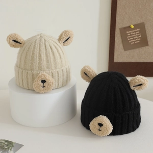 Cute bear knit beanie hats for kids in beige and black, featuring soft plush ears