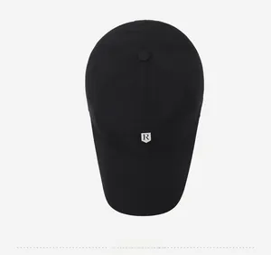Top view of black quick-dry baseball cap featuring a detailed shield 'R' emblem on the front