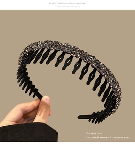 Detail of a black flocked headband with grey rhinestones and non-slip comb teeth