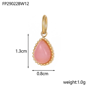 Detail view of teardrop pink stone pendant in gold plating with dimensions 1.3cm x 0.8cm