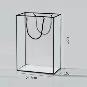 Detailed dimensions of transparent gift bag with black frame and rope handle features