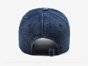 Rear view of vintage washed denim baseball cap with adjustable metal strap buckle