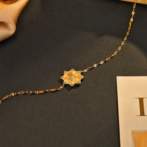 14K gold plated stainless steel starburst bracelet with turquoise beads and crystal