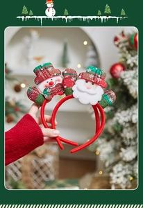 Detail of Christmas headbands with snowman and Santa figures in red festive fabrics