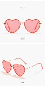 Front and side view of heart-shaped sunglasses with pink gradient lenses and gold frame