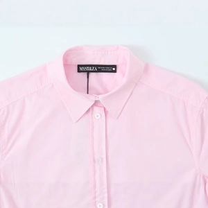 Pink minimalist poplin shirt for women featuring a clean collar and cotton texture
