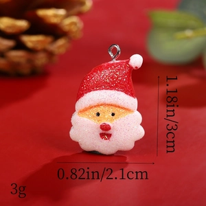 Macro view of Santa resin pendant with glitter finish and precise size measurements