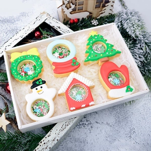 Christmas shaker cookie mold set with wreath snowman and tree shapes for festive baking