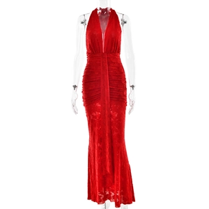 Close-up of red lace halter dress with deep V-neckline and elegant mermaid hemline
