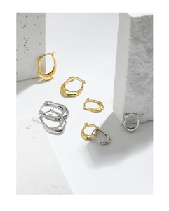 Detailed close-up showing the S925 sterling silver hallmark on irregular U-shape earrings