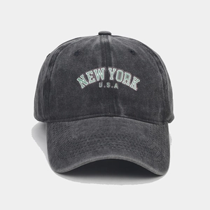 Detail of vintage washed charcoal baseball cap with New York U.S.A embroidery