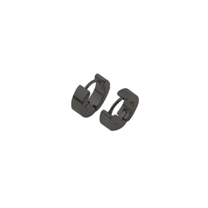Detail of black stainless steel hoop earrings with punk cross style on white background