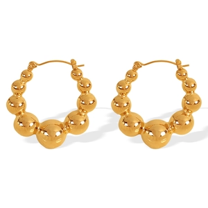 Gradient gold beaded hoop earrings with a modern bubble design for women