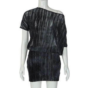Close-up of asymmetrical neck and abstract snakeskin tie-dye print on a mini dress