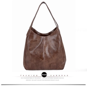 Front view of large dark brown tote bag with vintage lychee texture and stitch detail