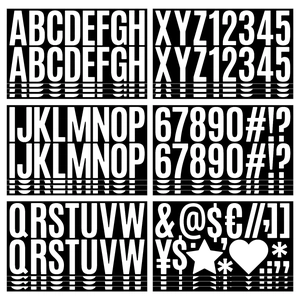 Close-up of 2.5 inch waterproof vinyl letter and number stickers with white text on black
