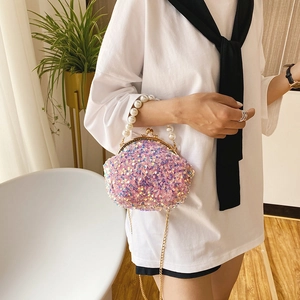 Pink sequin mini shell bag with pearl handle and golden chain strap for women