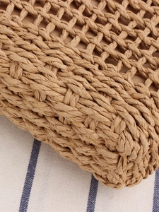Stylish khaki paper rope woven beach bag with hollow mesh texture for summer vacation