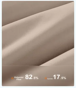 Dettaglio del tessuto a maglia fitta con texture in 82,5% poliestere e 17,5% elastan