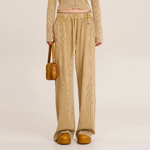 Vintage mustard yellow drawstring wide-leg pants with retro corduroy texture