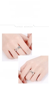 Detail view of couple rings with 520 and 1314 numeric designs and sparkling stones