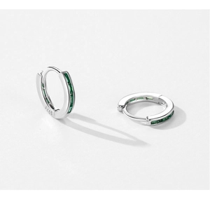 Detailed view of S925 sterling silver hoop earrings with emerald green zircon stones