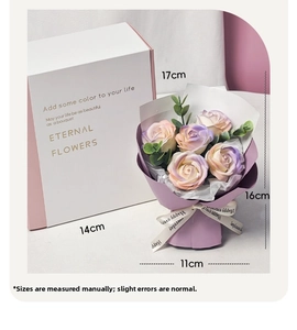 Detail view of purple soap rose bouquet with Happy Everyday ribbon and white gift box
