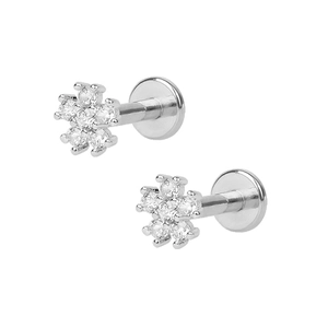 Close-up of s925 silver snowflake earrings with cubic zirconia and screw flat back