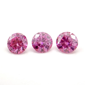 Detailed view of three round pink moissanite stones with hearts and arrows cut