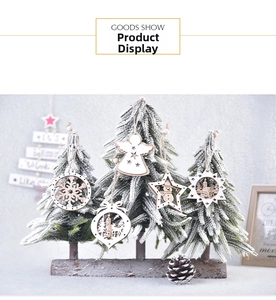 Detail of wooden hollow Christmas ornaments featuring snowflakes and reindeer patterns