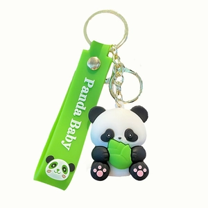 Cute panda silicone keychain with green 'Panda Baby' strap and gold lobster clasp