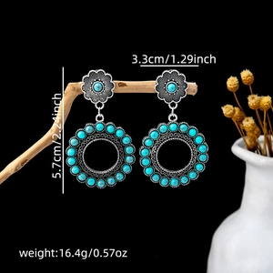 Detailed view of bohemian turquoise drop earrings with dimensions and vintage silver finish