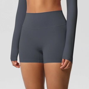 Close-up of high-waisted seamless charcoal grey yoga shorts with wide tummy control waistband